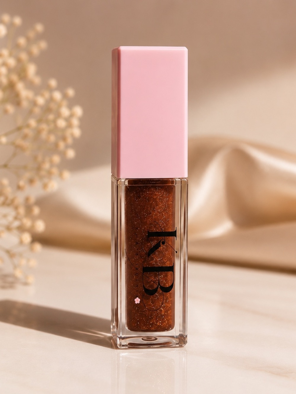 K.B. Shimmering Brown Lip Gloss with Pink Cap